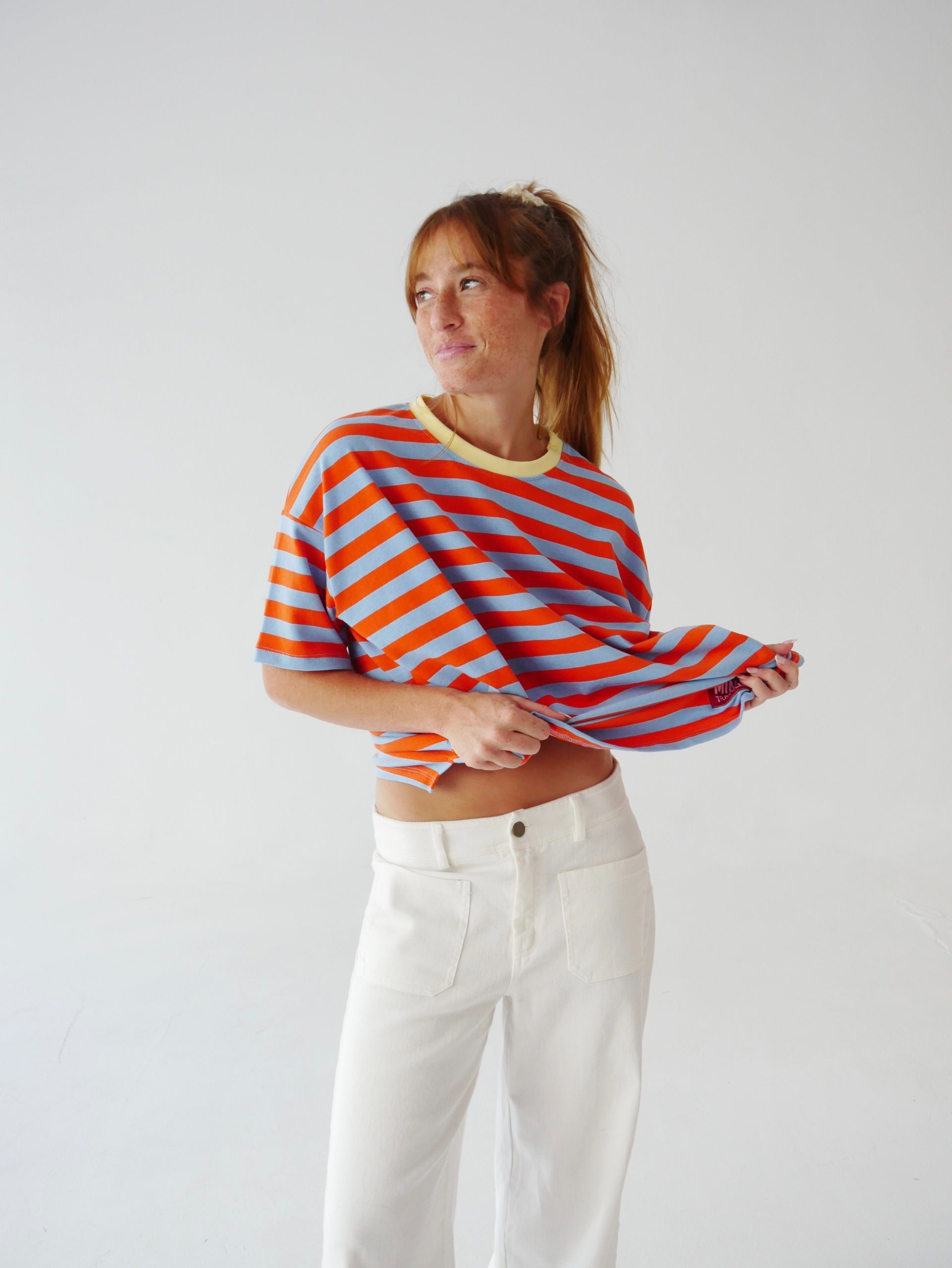Camiseta Nunu Naranja y Celeste
